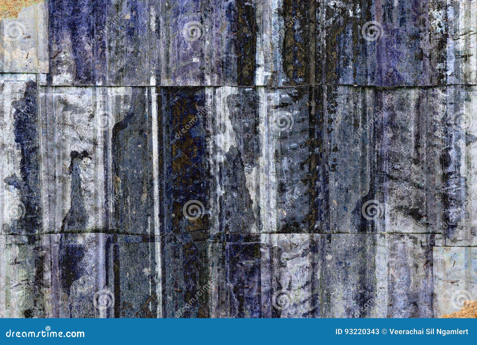 Paint Peeling Off the Walls Stained with Waste Paper. Stock Image