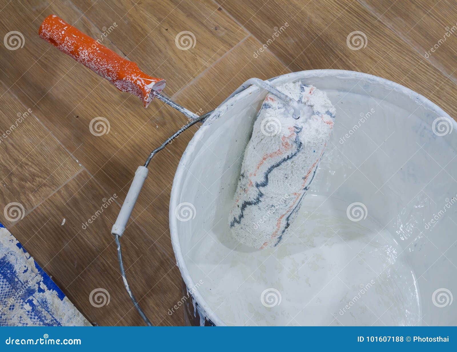 Paint Roller on the White Color Bucket. Stock Photo Image of