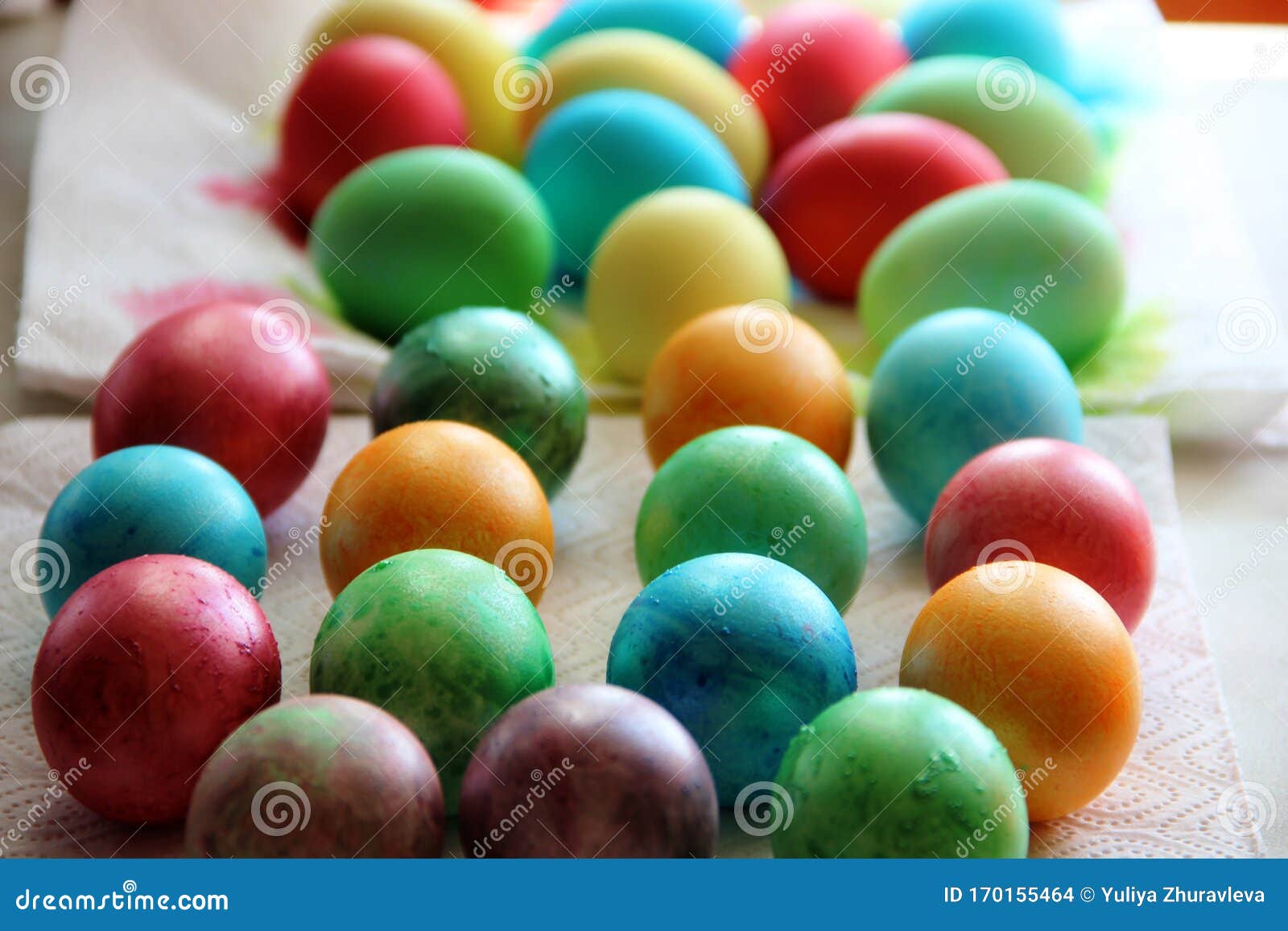 Painted in Different Colors Easter Eggs in a Row. Conveyor Belt on ...