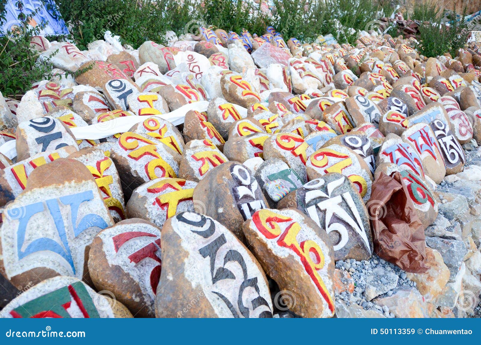 Painted stones in Tibet editorial stock image. Image of painted 50113359