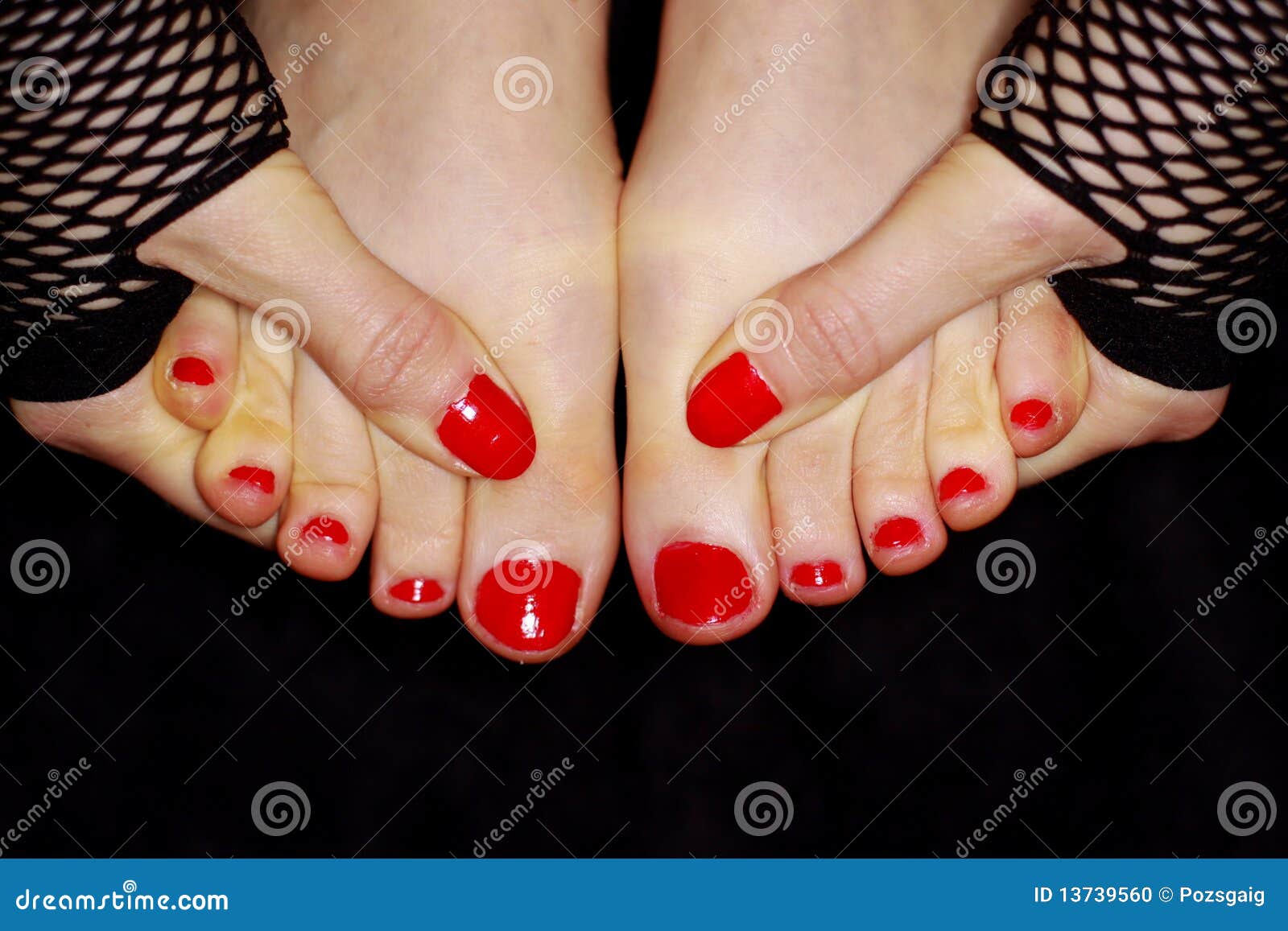 Painted toe nails stock photo. Image of black, hand, body 13739560