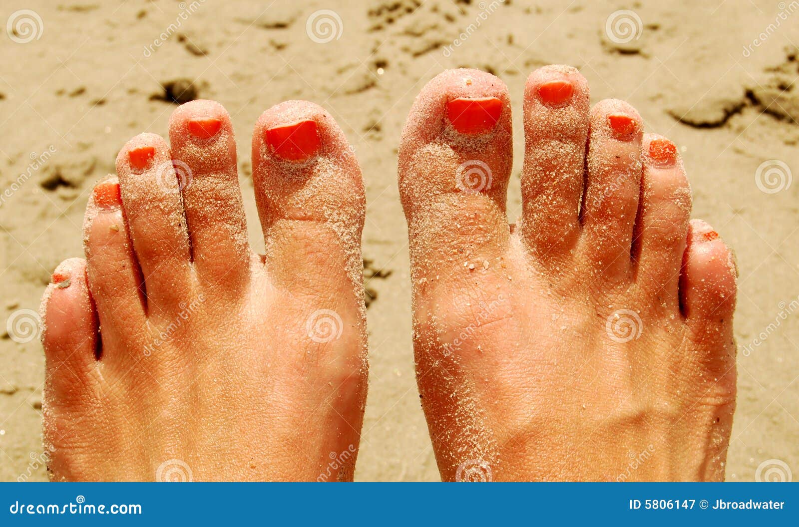 painted toes at beach