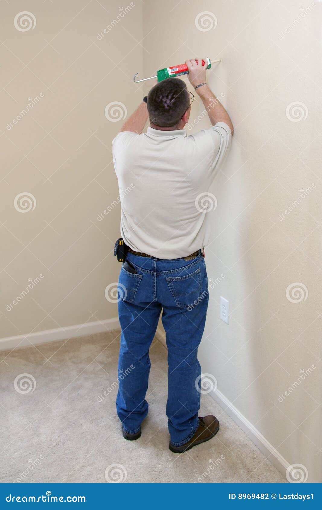 Painter Caulking Walls stock photo. Image of green, craft 8969482