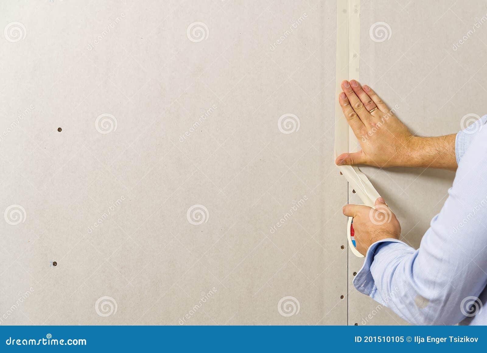 Painter Glue the Joints between the Drywall, Plasterboard Sheets Stock