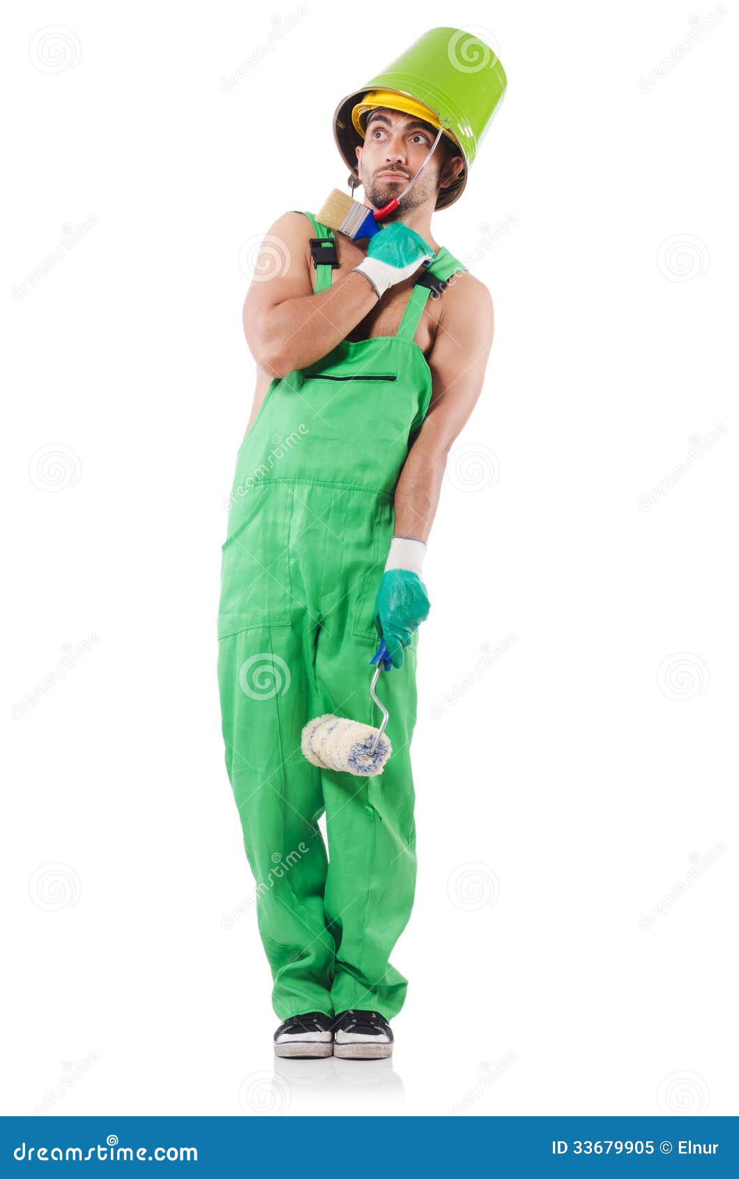 Painter in green coveralls stock image. Image of construction 33679905