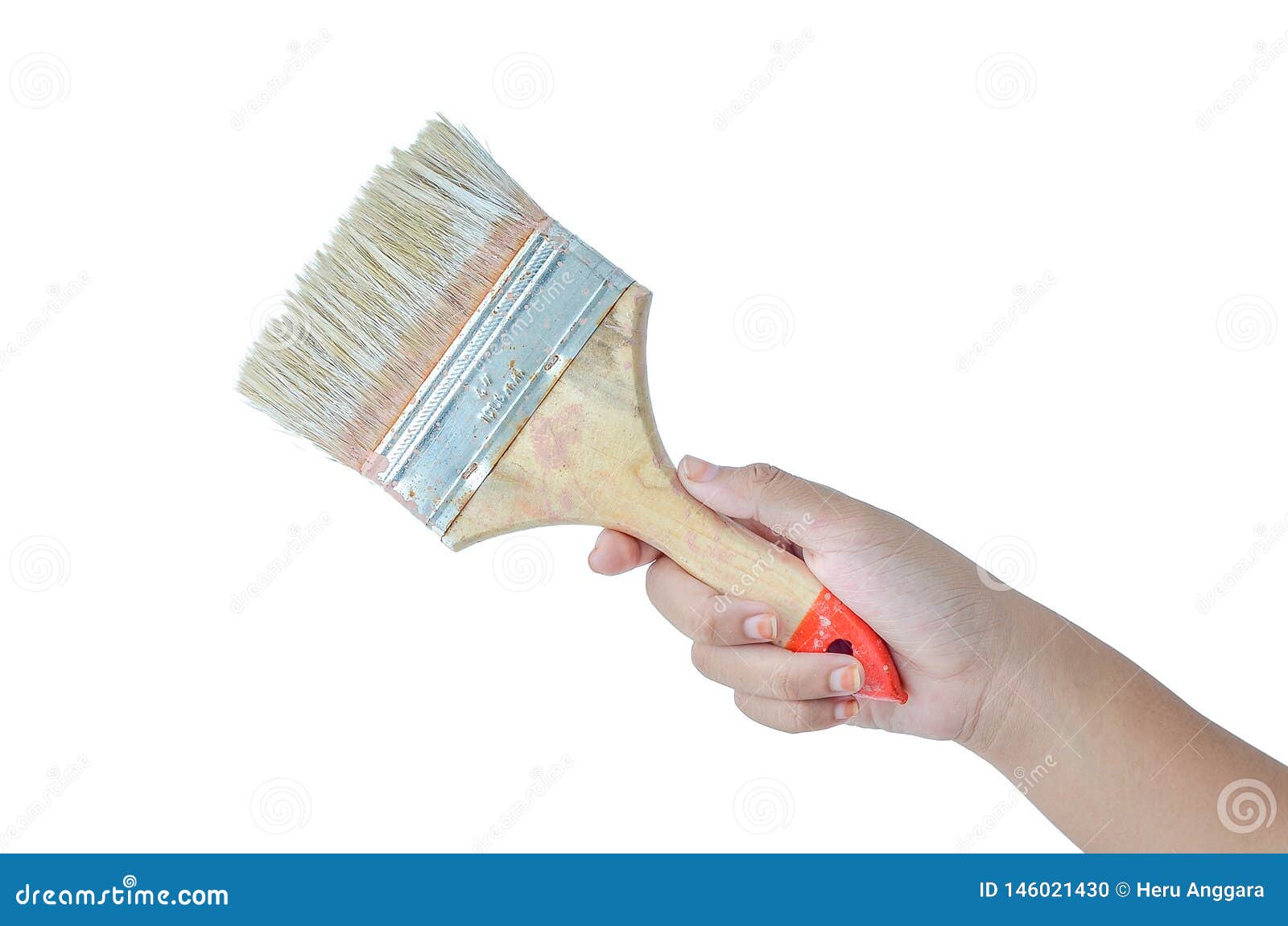 Hand holding paint brush, Stock image