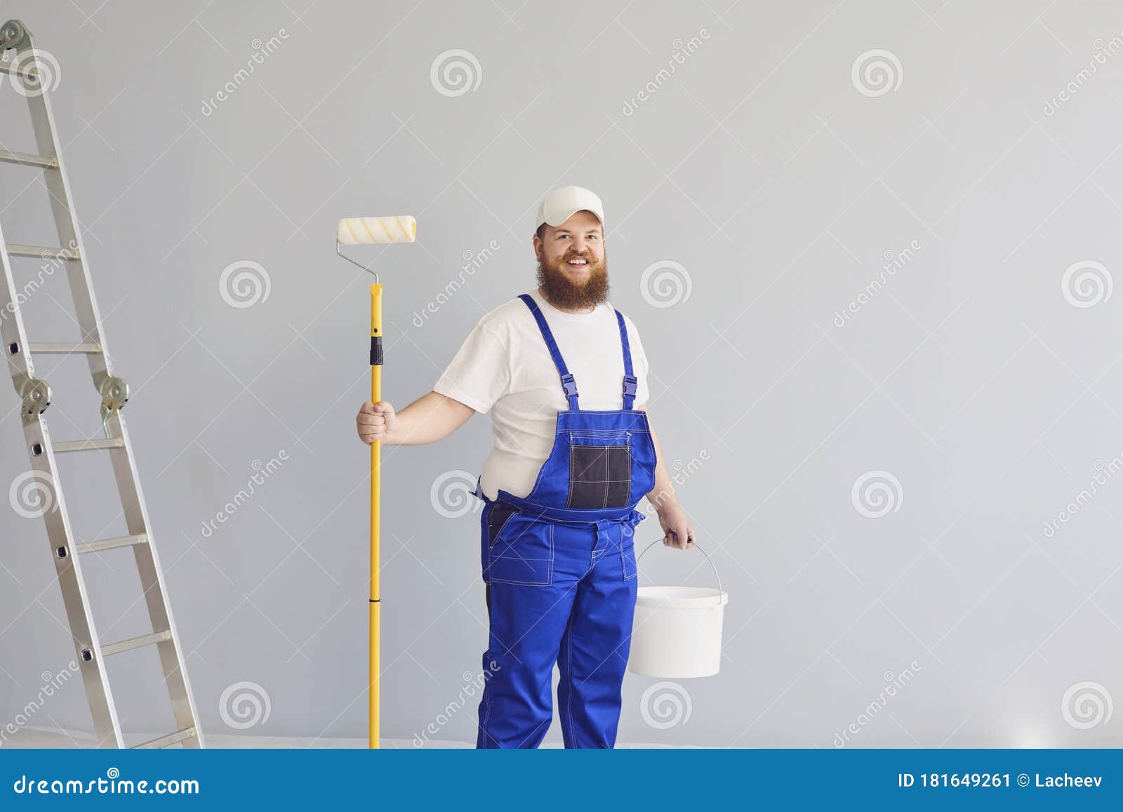 Painter Painting. Funny Male Painter with a Roller Skater Standing Paints  in the Background. Stock Image - Image of house, drawing: 181649261