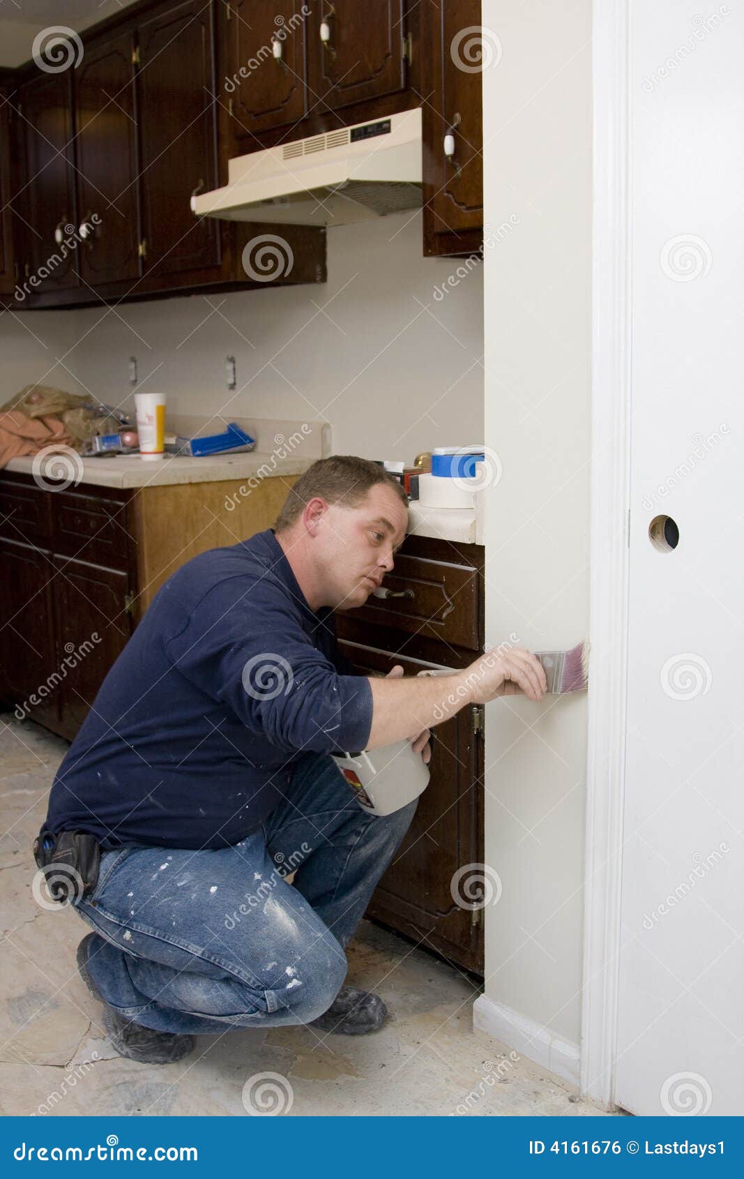 Painter Painting Interior Trim Stock Photo - Image of customer