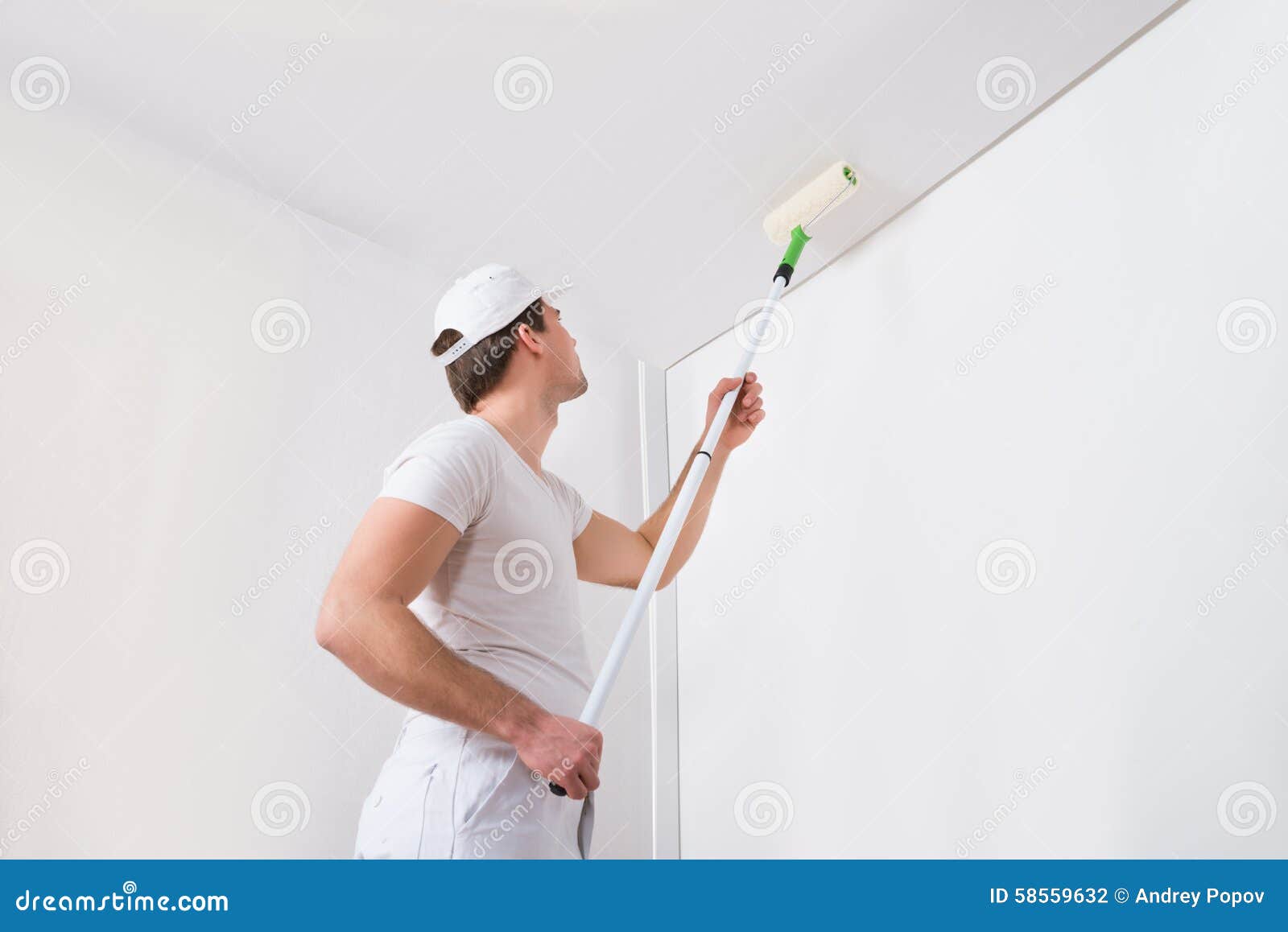 painter painting on wall
