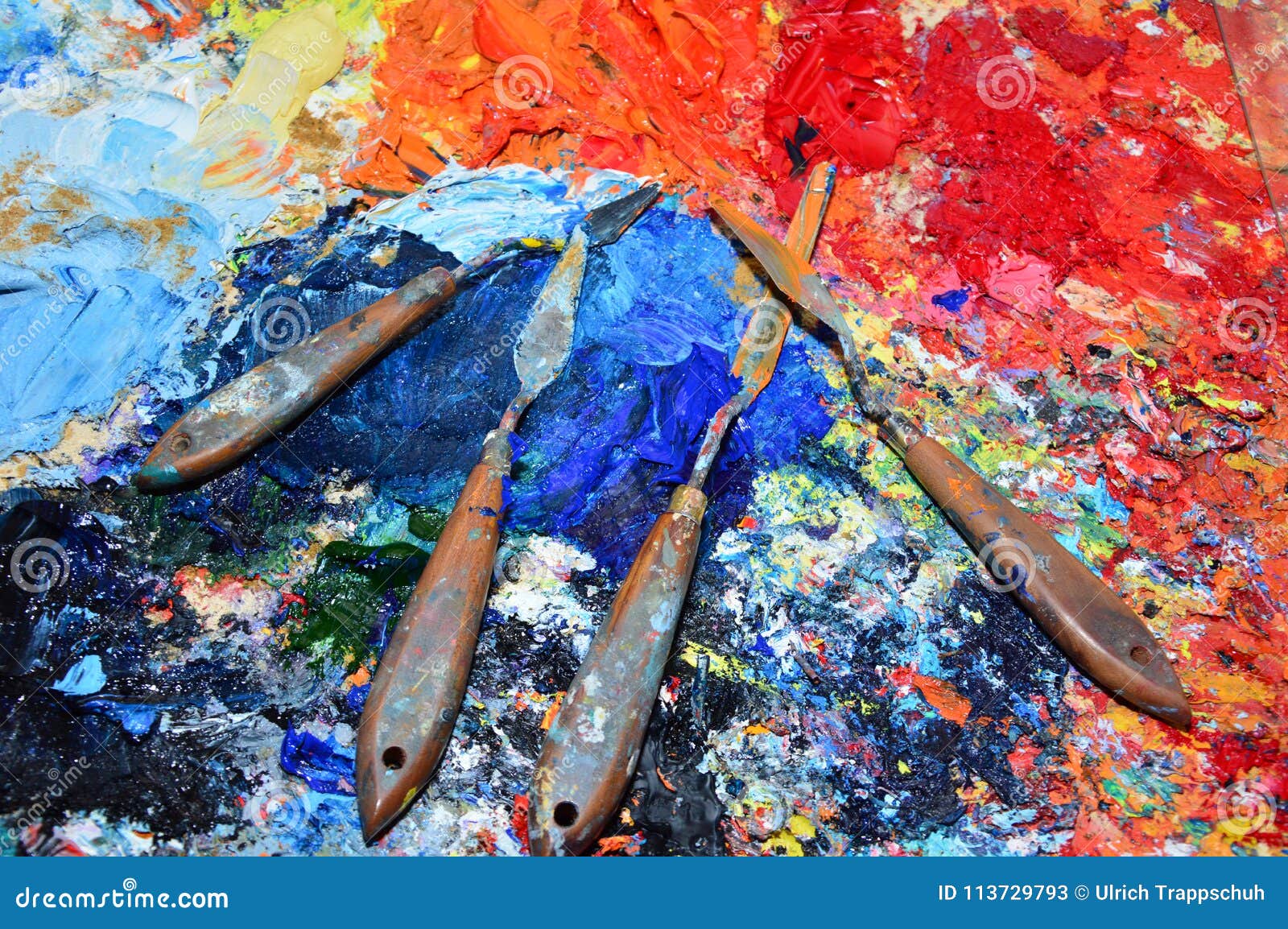 A Painter`s Palette in His with Tools Stock Image Image of
