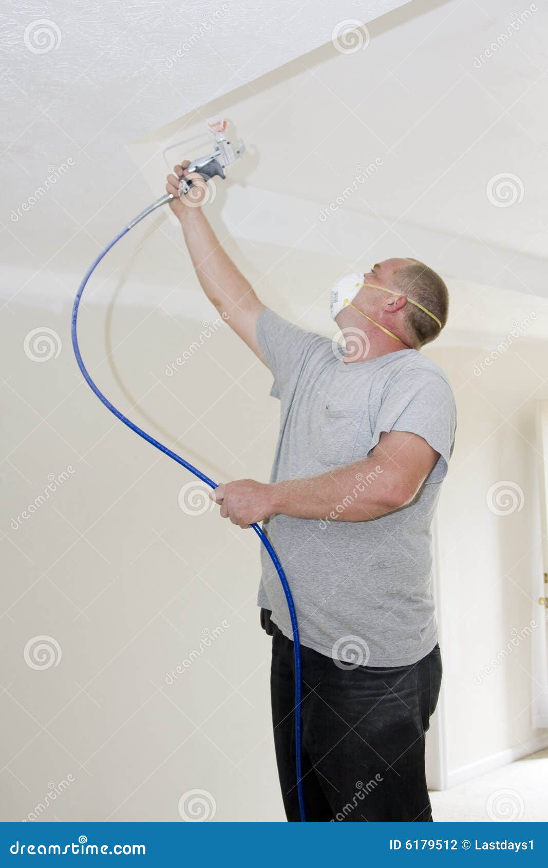 Painter spray painting stock photo. Image of customer 6179512