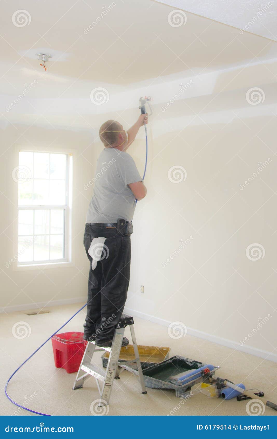 Painter Spray Painting Stock Photo Image Of Indoors