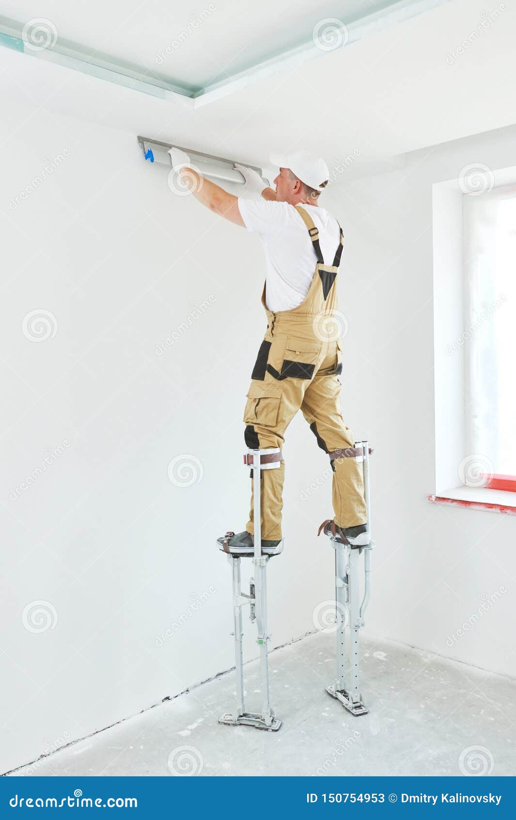 Painter In Stilts With Putty Knife Plasterer Smoothing Ceiling