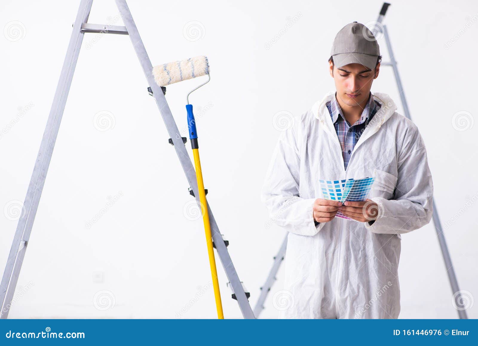 Painter Working at Construction Site Stock Photo - Image of colours