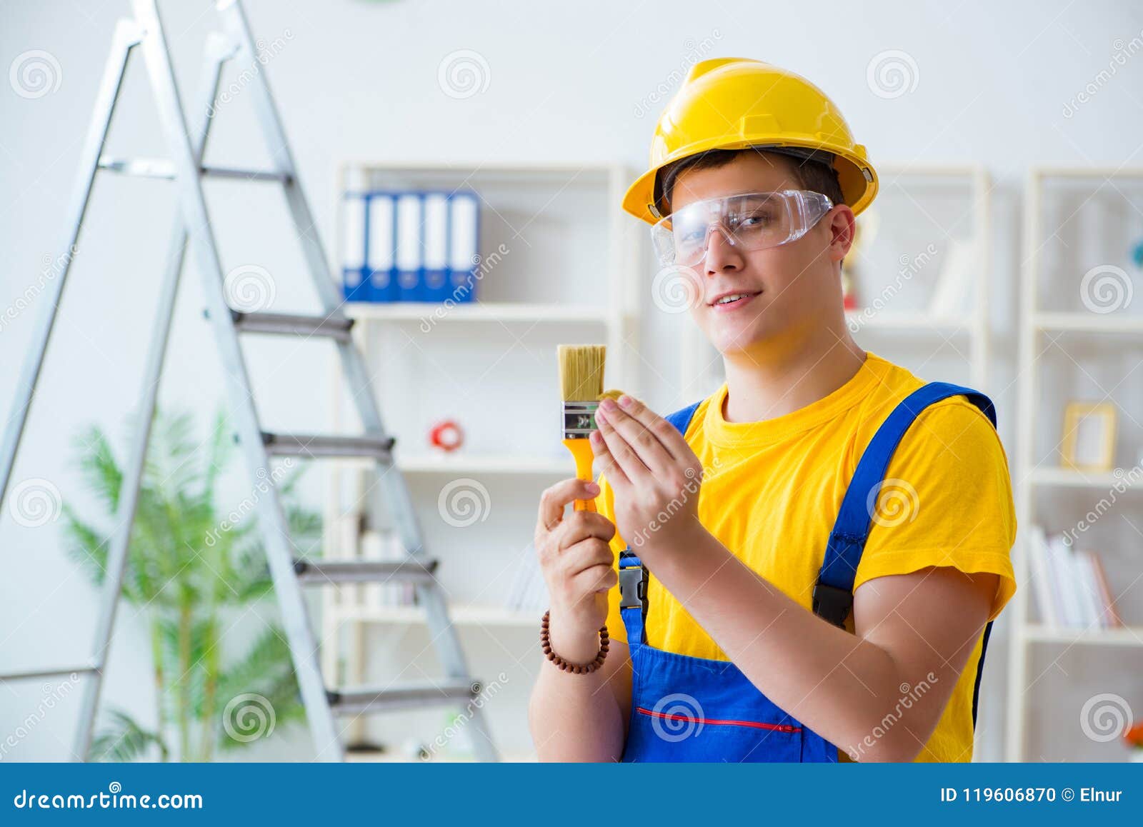 The Painter Working at Home in Refurbishment Project Stock Photo