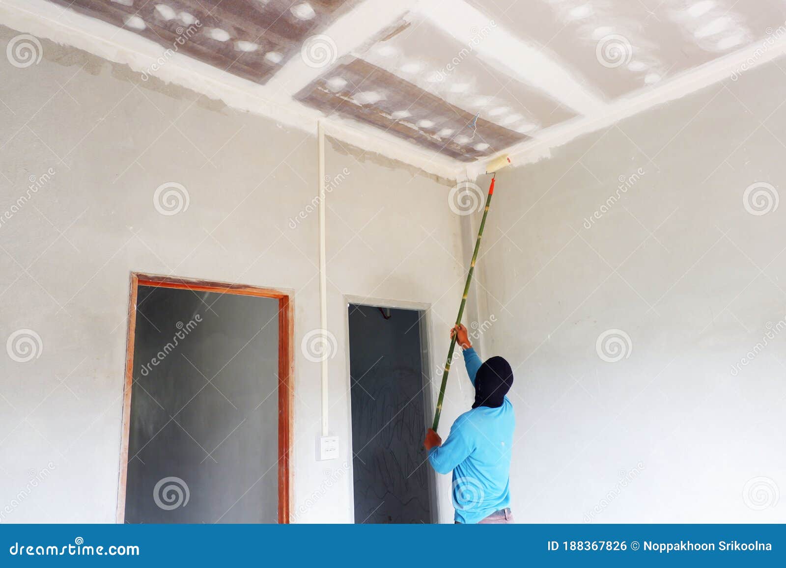 Painters are Painting the Ceiling of a New Home Stock Photo Image of paint, people 188367826