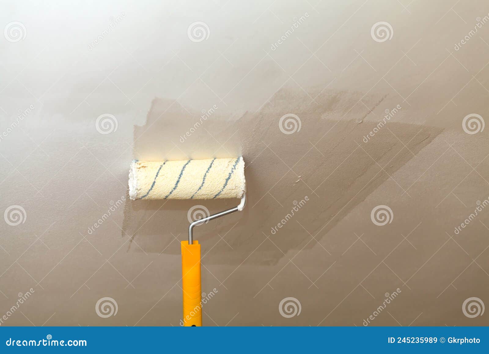 Painting the Ceiling a Roller with White Paint Stock Image Image of