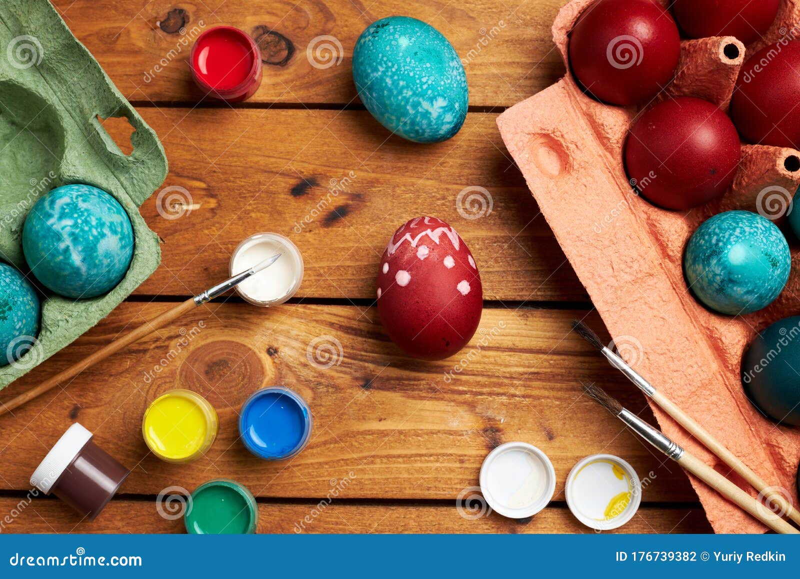 Painting Eggs. Paints and Brushes for Coloring Eggs for Holiday Stock