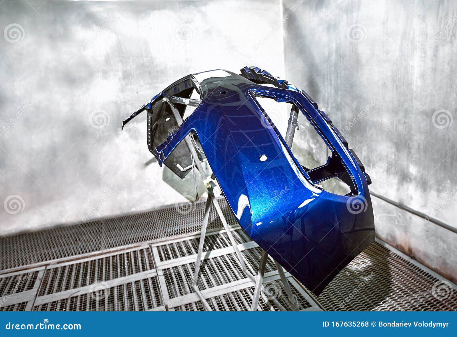 Preparation and Painting of Car Parts after an Accident Stock Photo