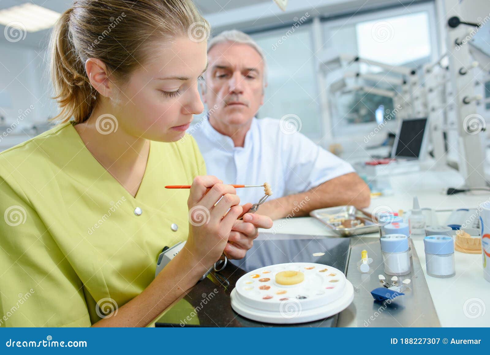 She painting false teeth stock image. Image of working 188227307