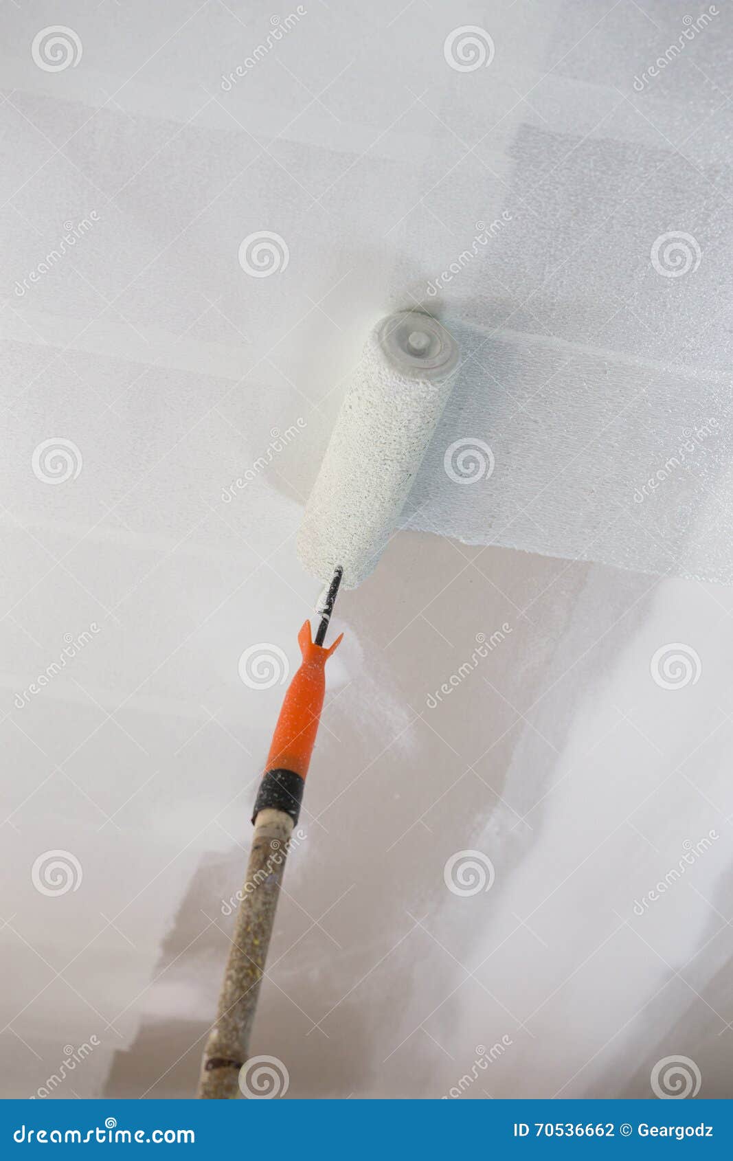 Painting a Gypsum Plaster Ceiling with Roller Stock Photo Image of