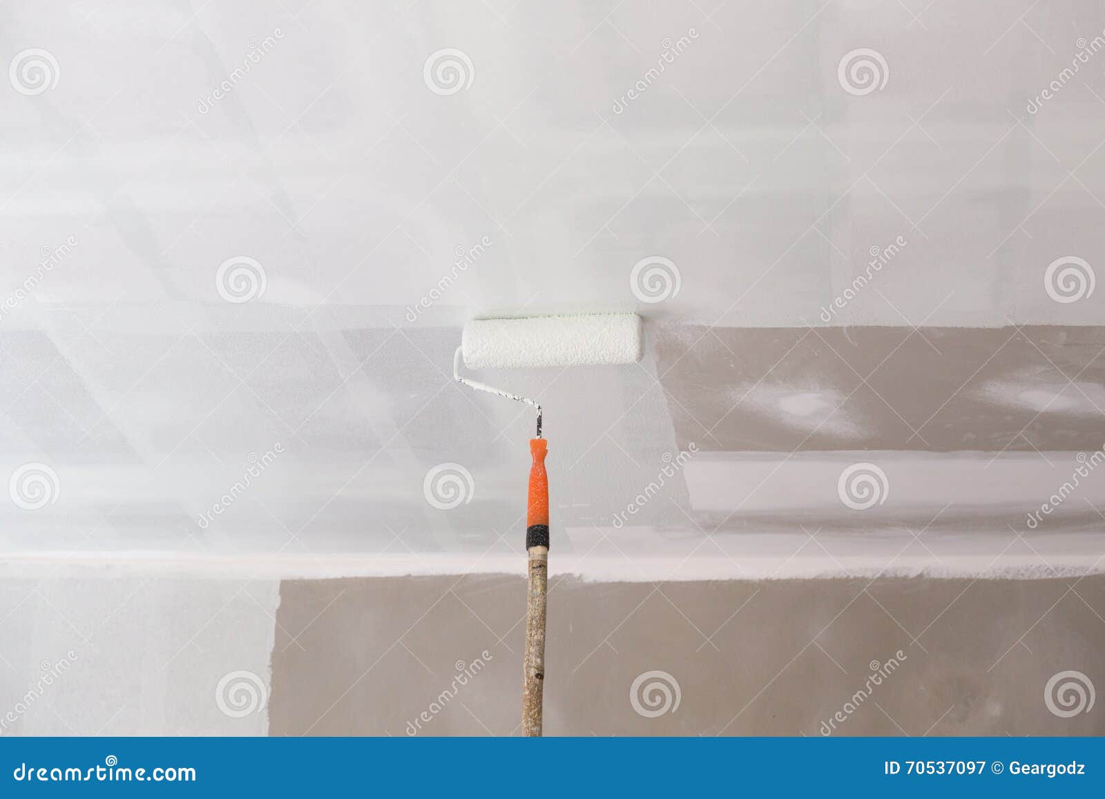 Painting a Gypsum Plaster Ceiling with Roller Stock Image Image of