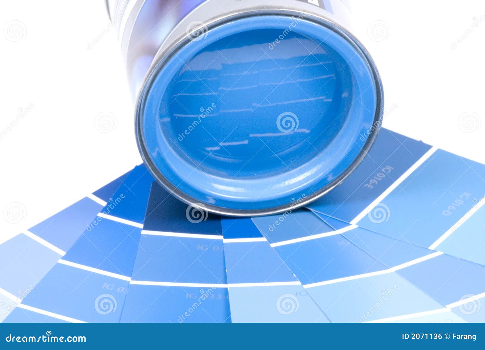 A Can of Blue Acrylic Paint and Some Paint Swatches Stock Photo Image