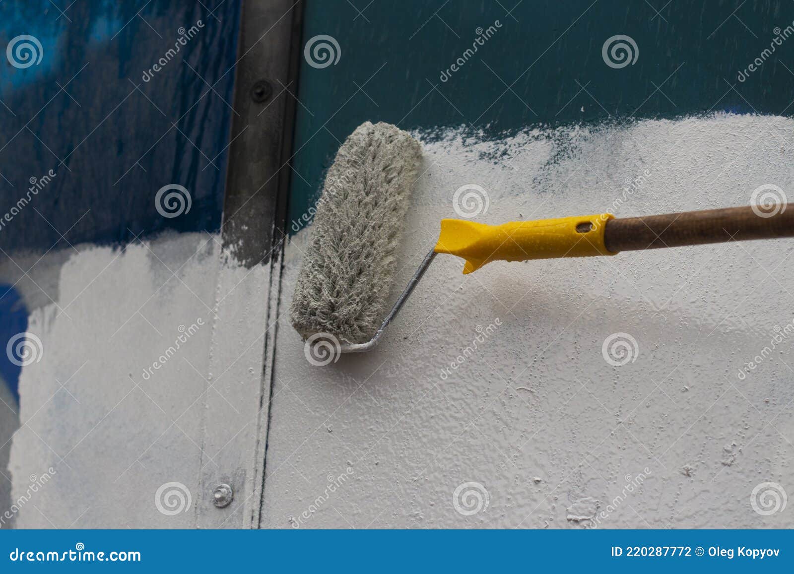 Paints the Graffiti with a Roller Stock Photo Image of obsolete, hair