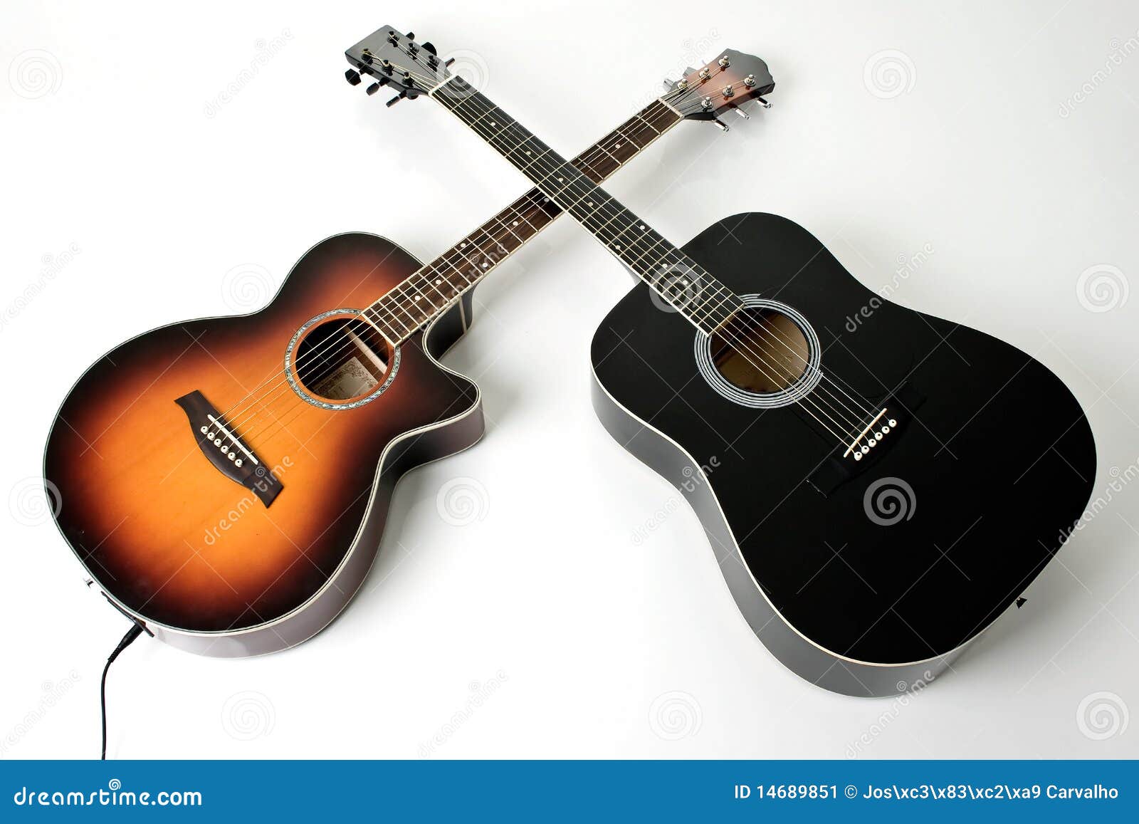 pair of acoustic guitars