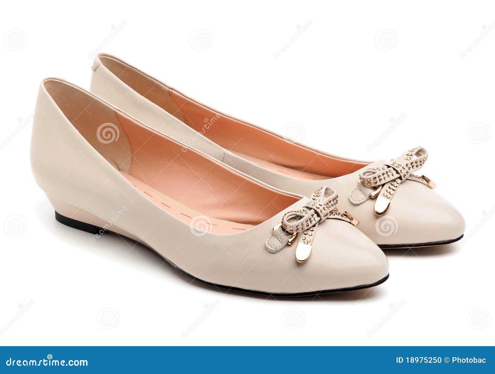 Pair of beige female shoes stock photo. Image of pumps - 18975250