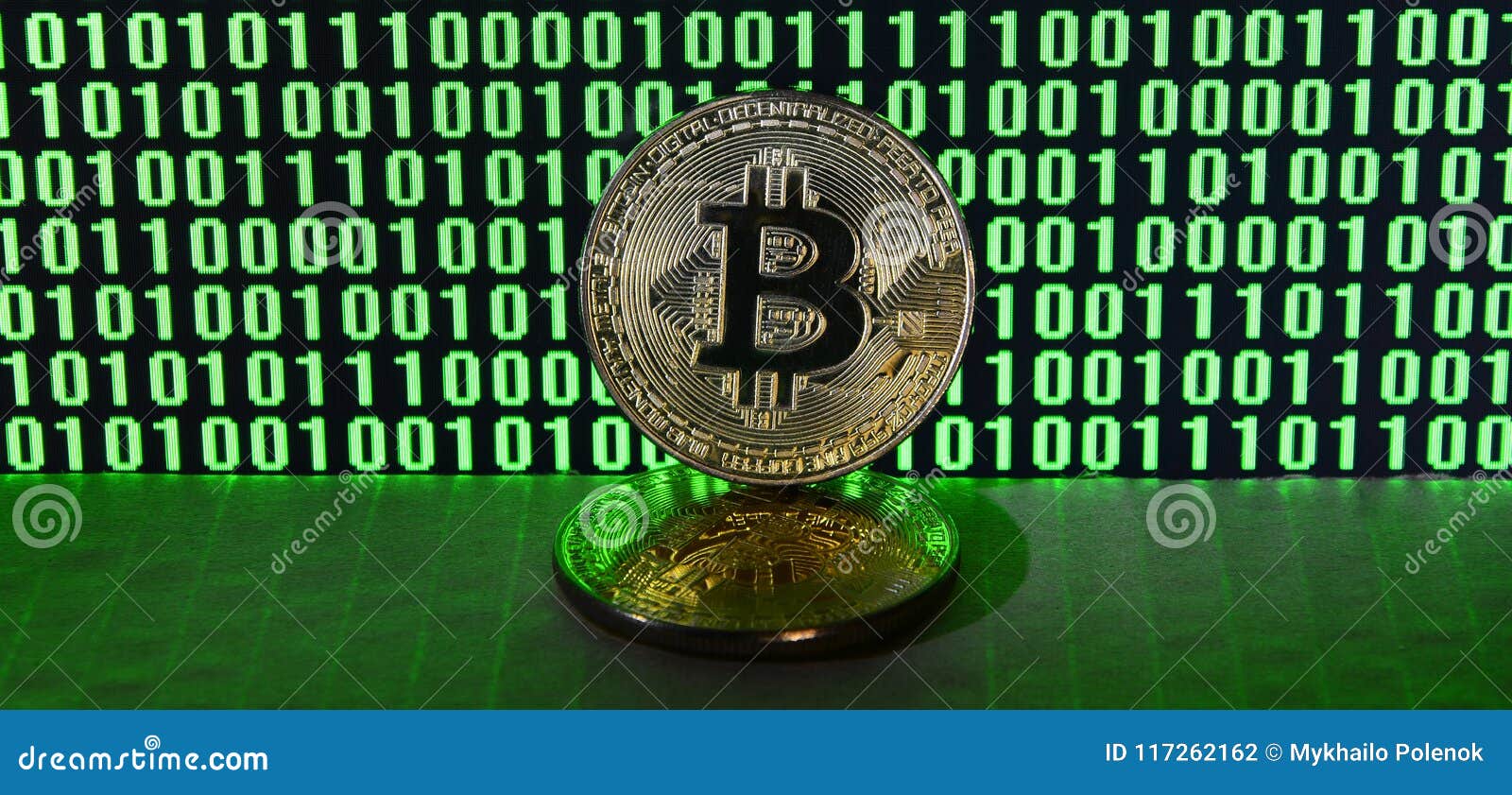 A Pair Of Bitcoins Lies On A Cardboard Surface On The Background Of - 
