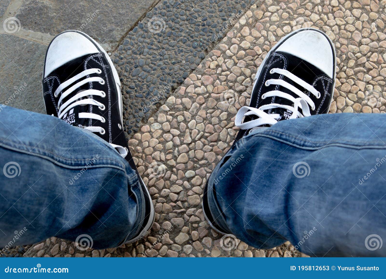 A Pair of Black Sneakers with White Laces Stock Image - Image of ...