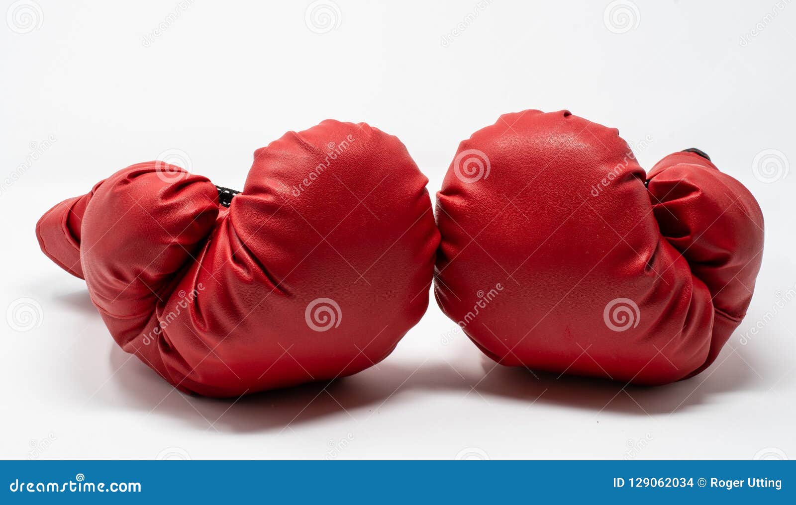 Pair of boxing gloves stock photo. Image of game, cushioned 129062034