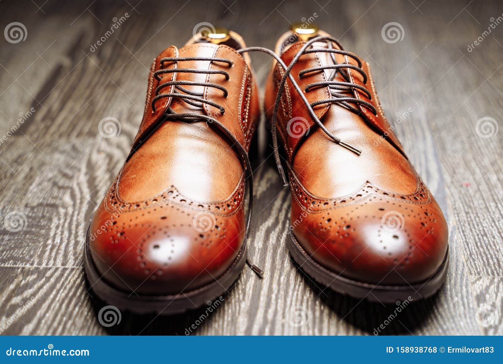 Pair of Brown Leather Men`s Shoes on the Wooden Floor Stock Photo ...