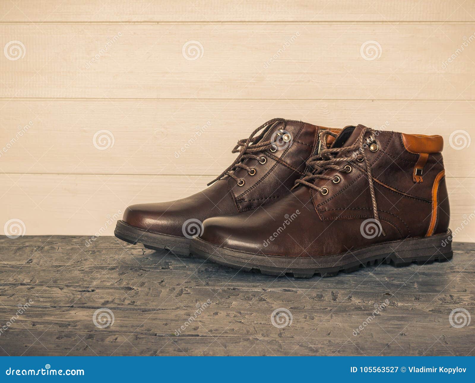 Pair of Brown Men`s Classic Shoes on the Dark Floor Wooden Walls ...