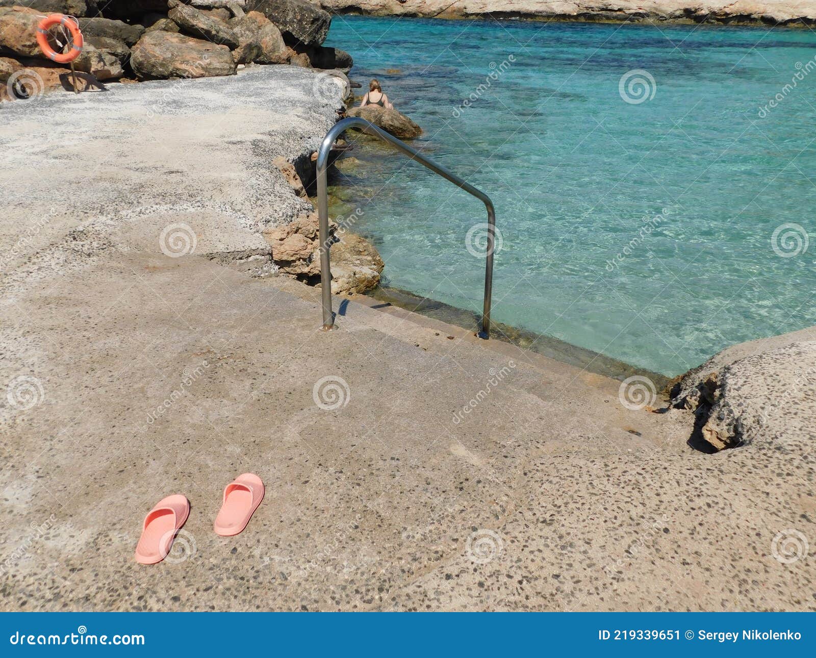 A Pair of Flip-flops Stuck on the Sand of a Beach Stock Image - Image ...