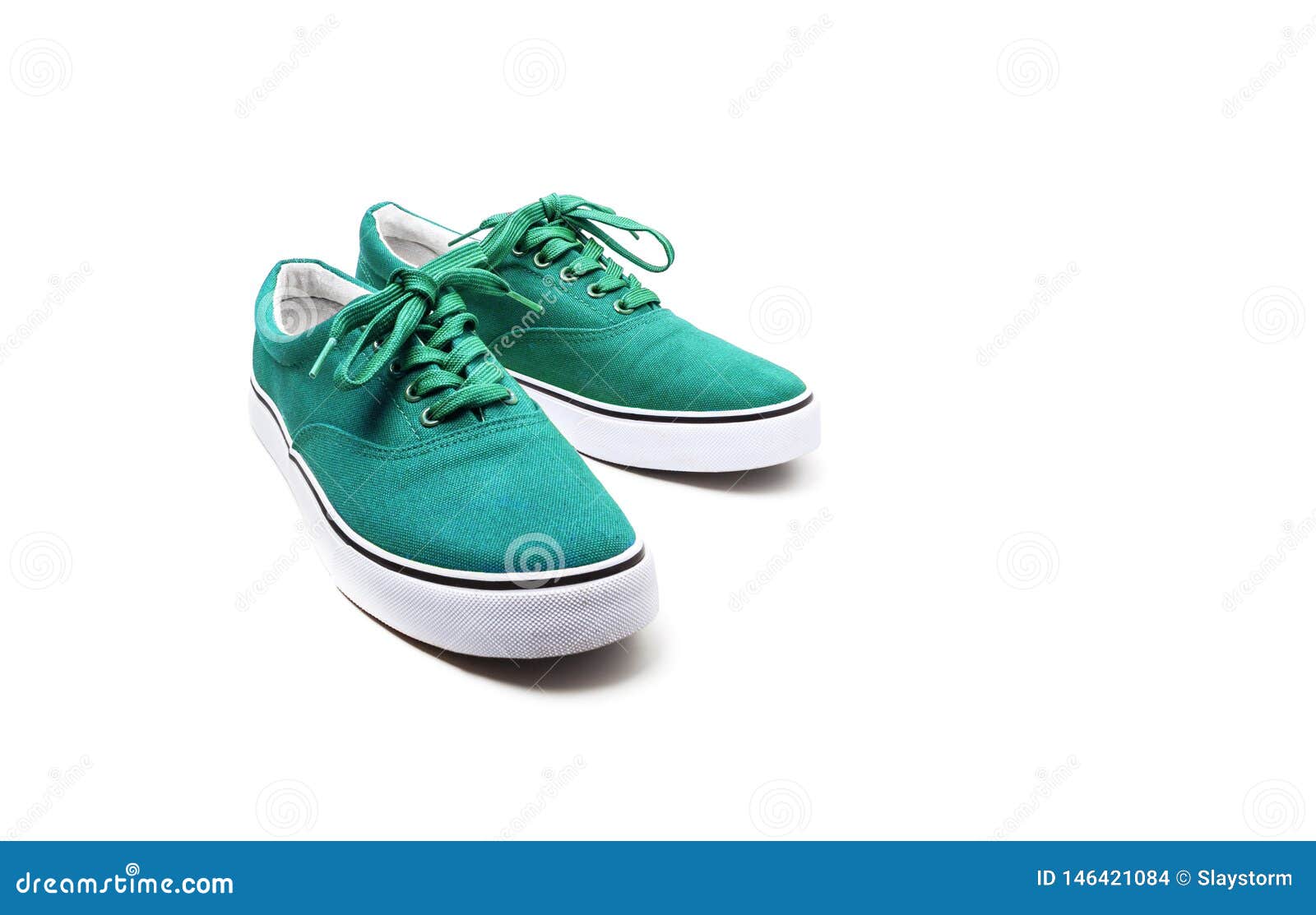 A Pair of Green Canvas Shoes Isolated on White Stock Photo - Image of ...