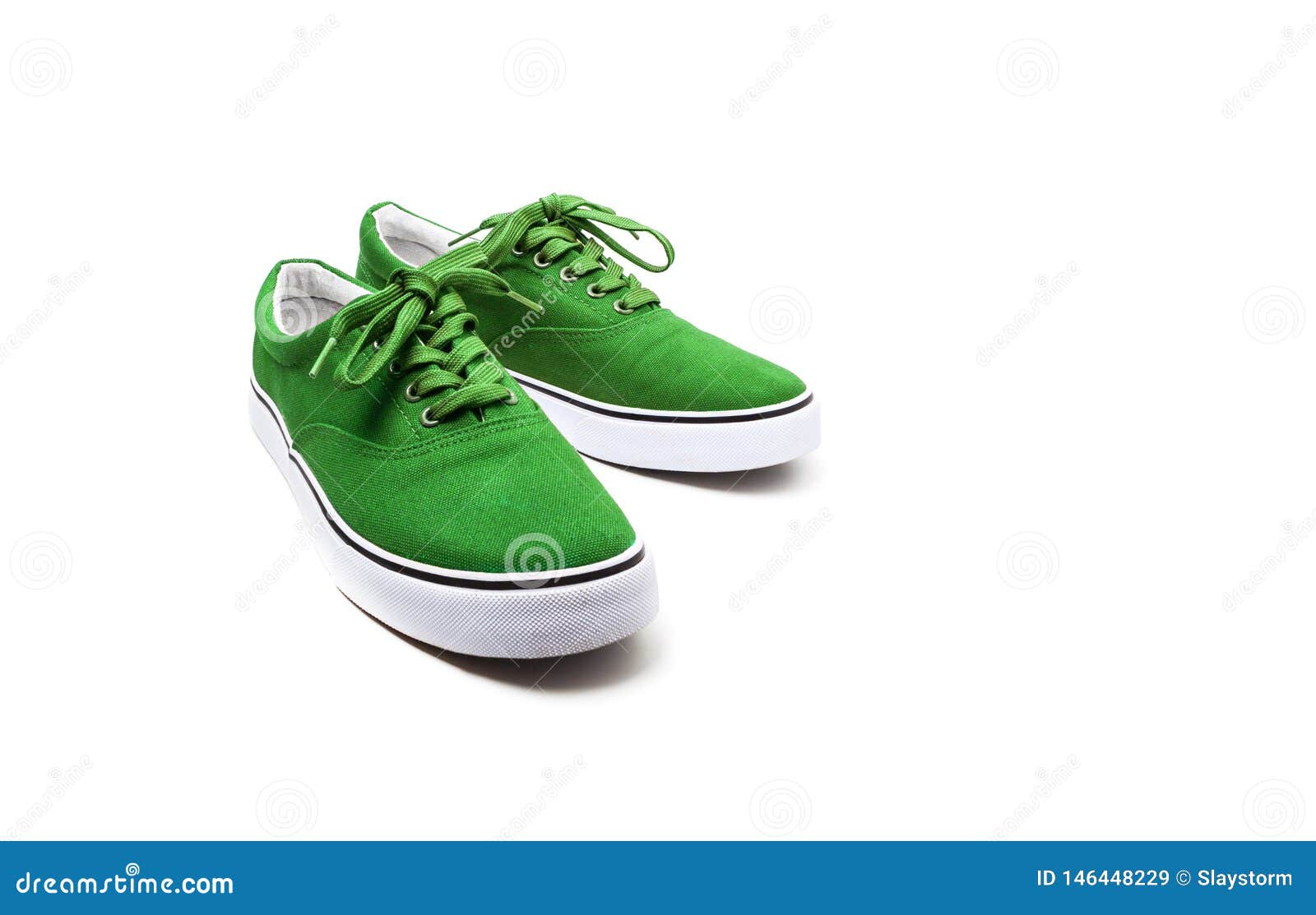 A Pair of Green Canvas Shoes Isolated on White Stock Image - Image of ...