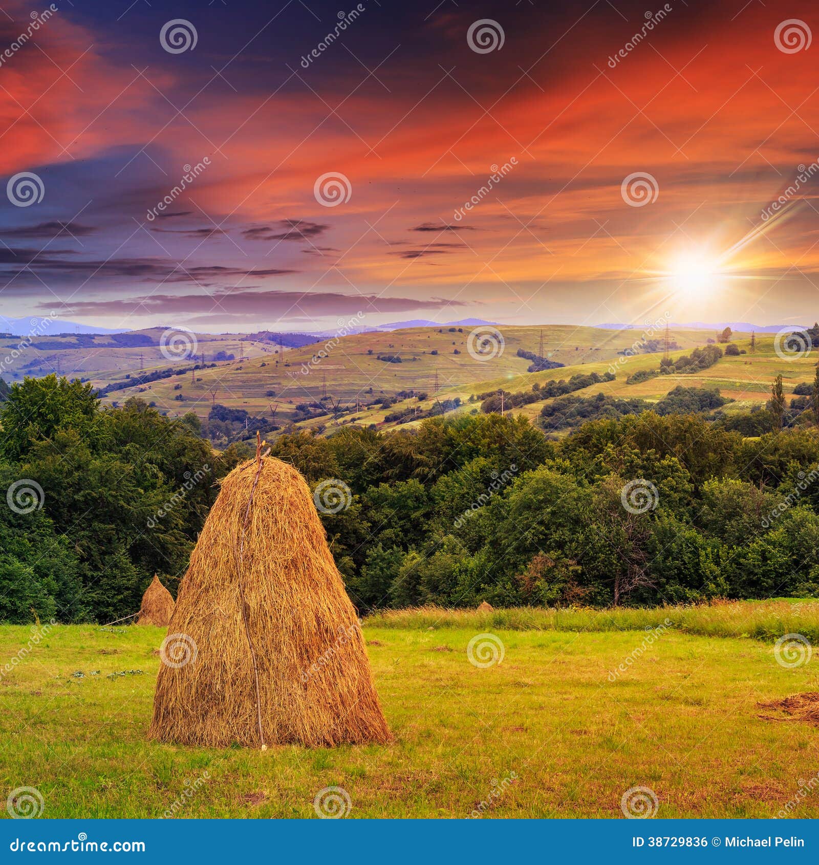 Pair of Haystacks and Tree at Mountain at Sunset Stock Photo Image of