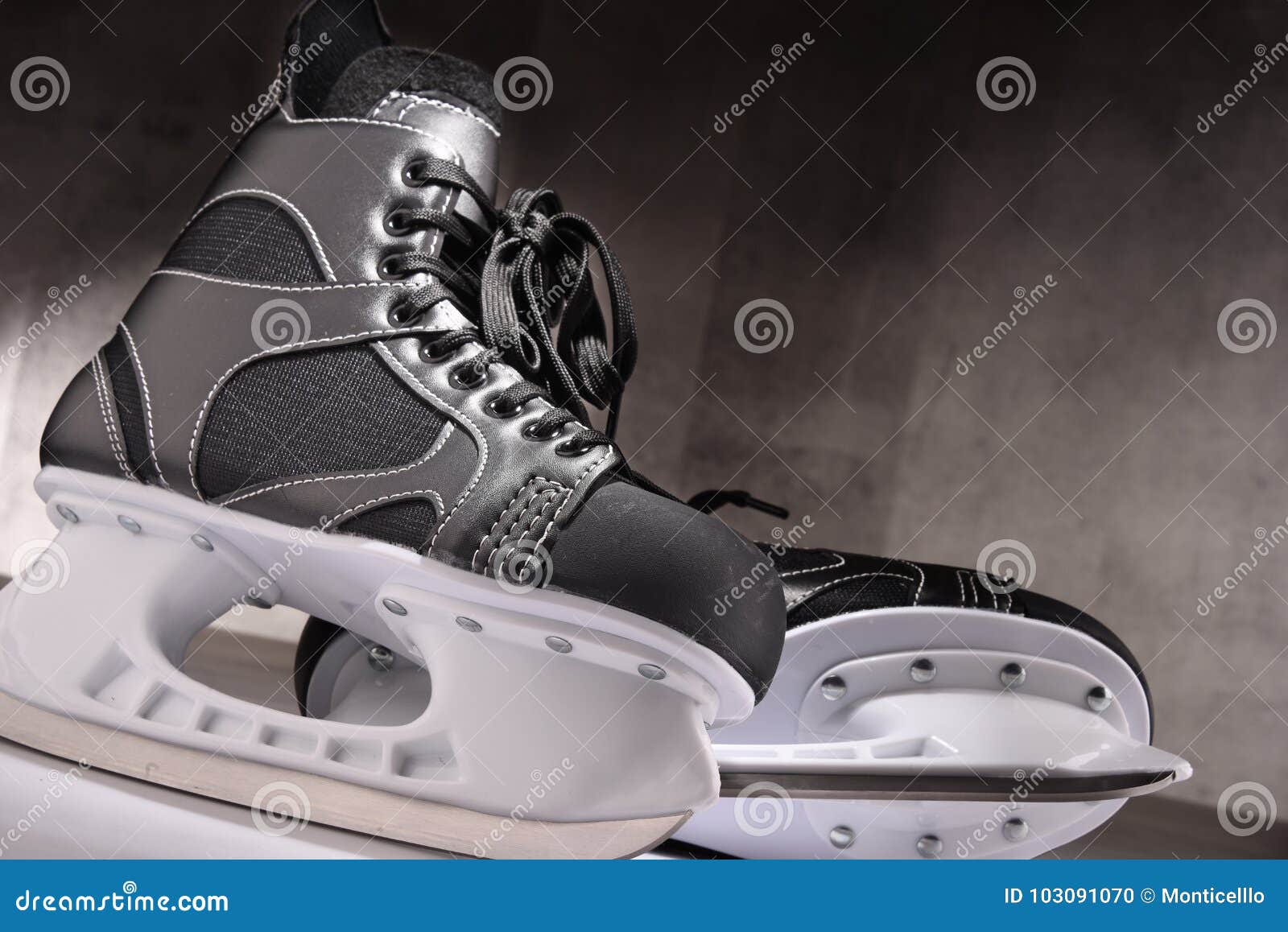 Pair of ice hockey skates stock