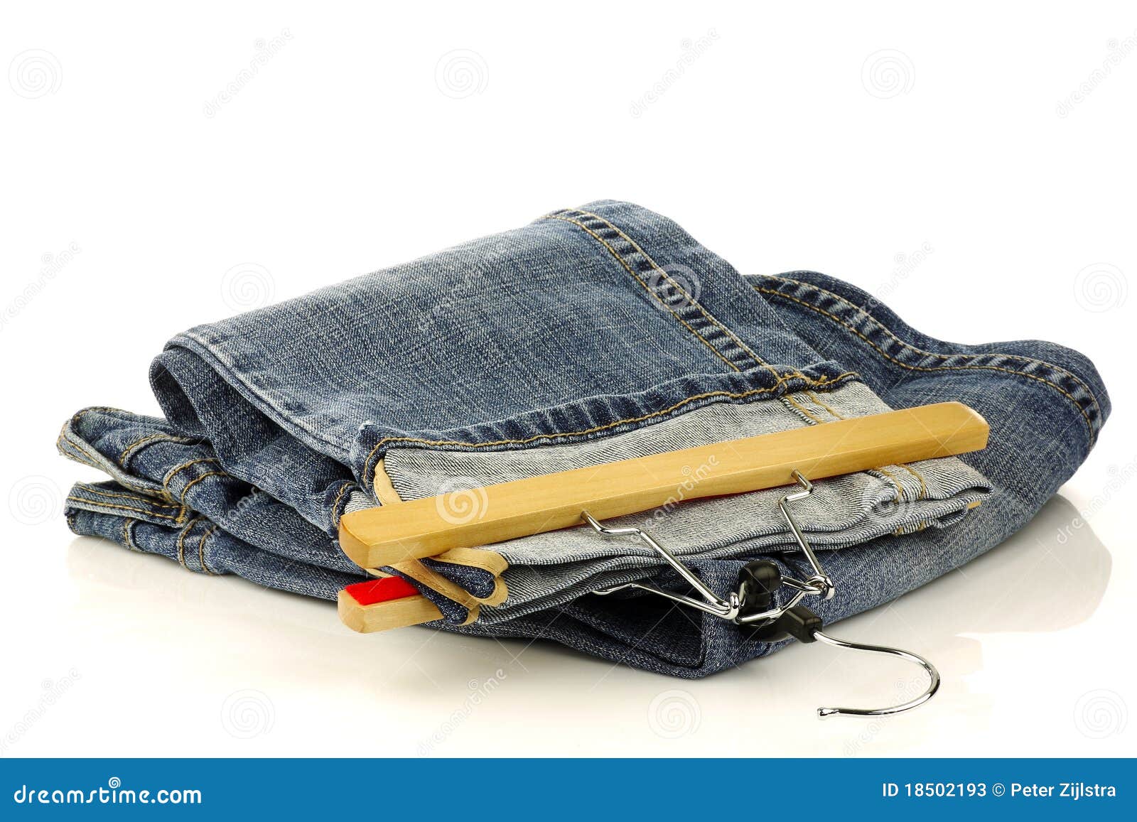 Pair of Jeans with a Clothes Hanger Stock Image Image of folded, blue