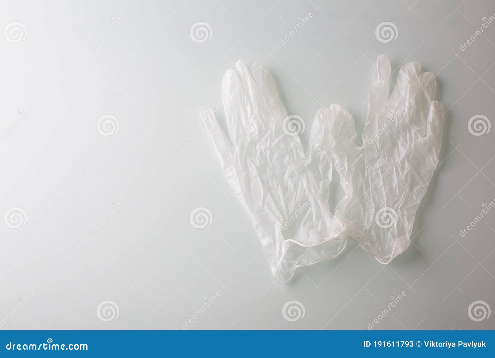 A Pair of a Latex Gloves on a Grey Background Stock Image - Image of