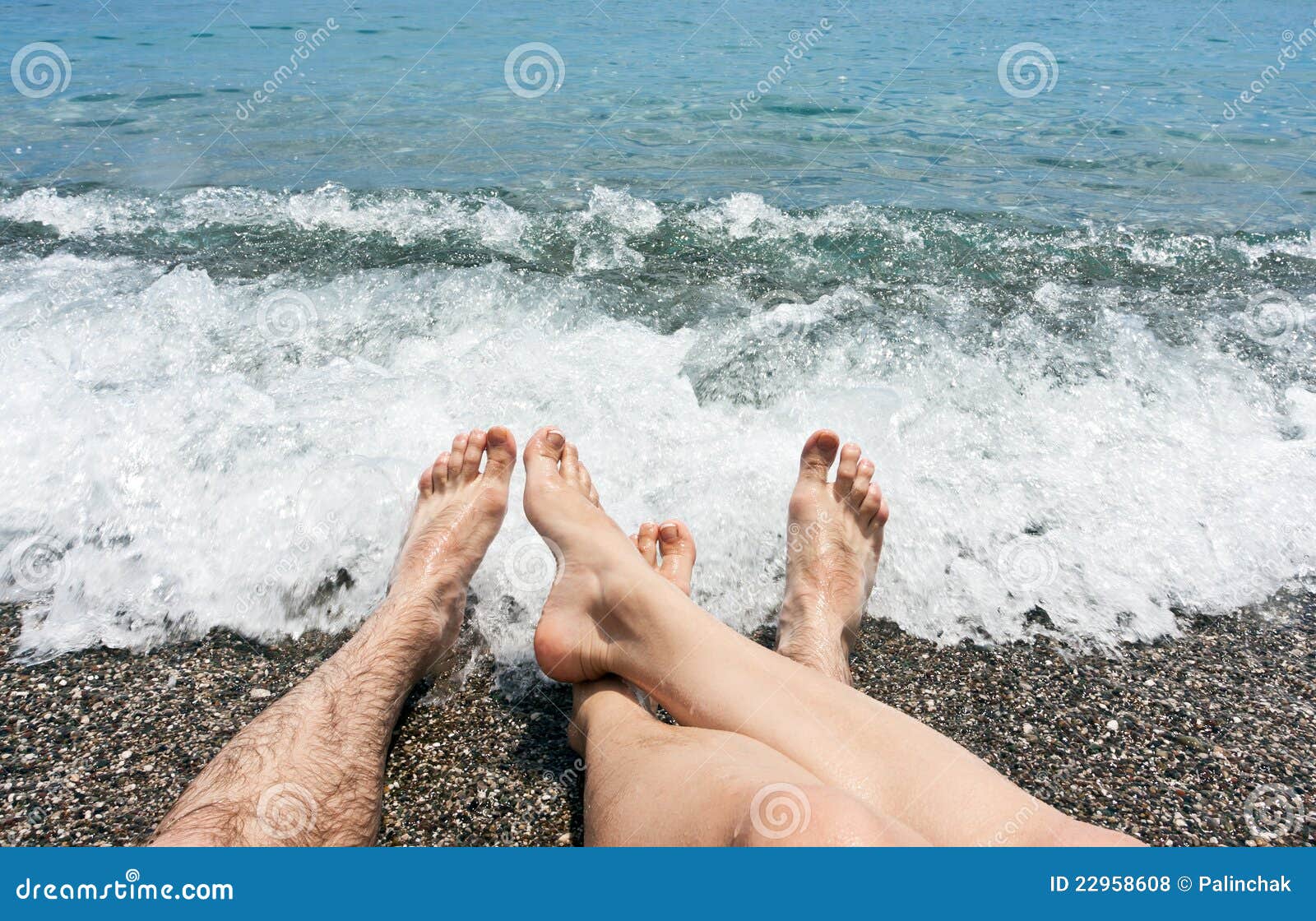 Pair legs on sea beach stock photo. Image of legs, blue 22958608
