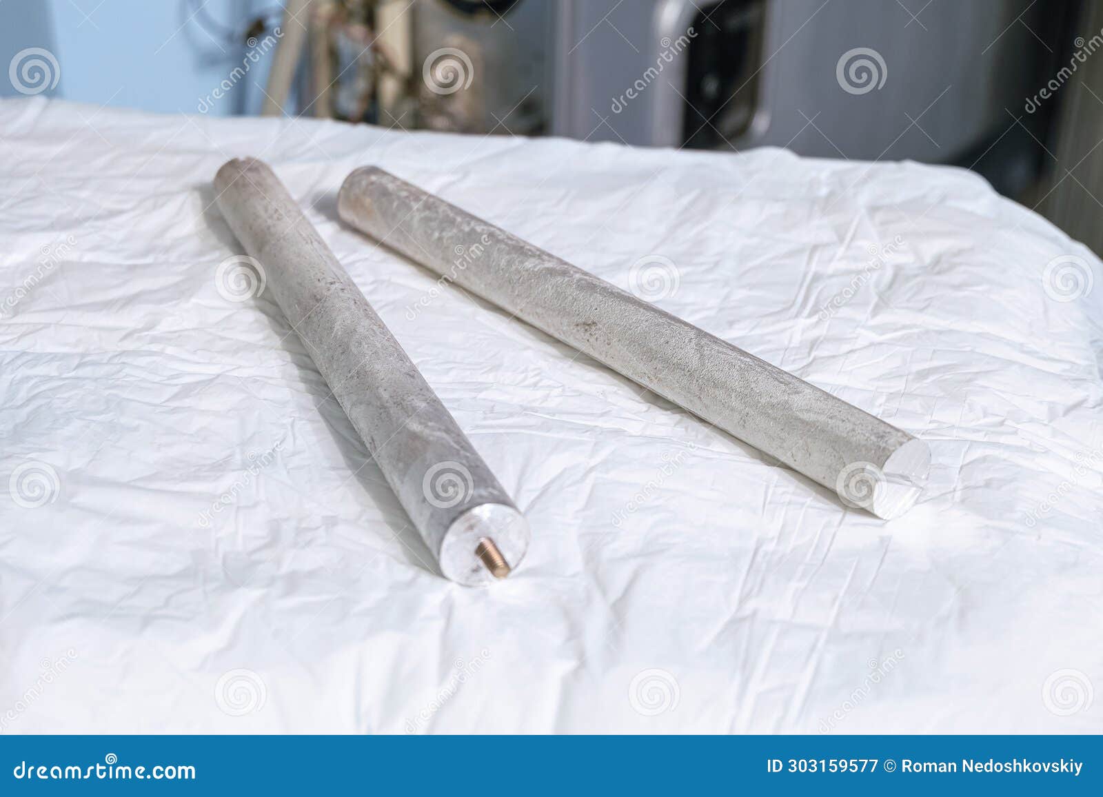 Pair of Magnesium Anodes for Heating Element of an Electric Water