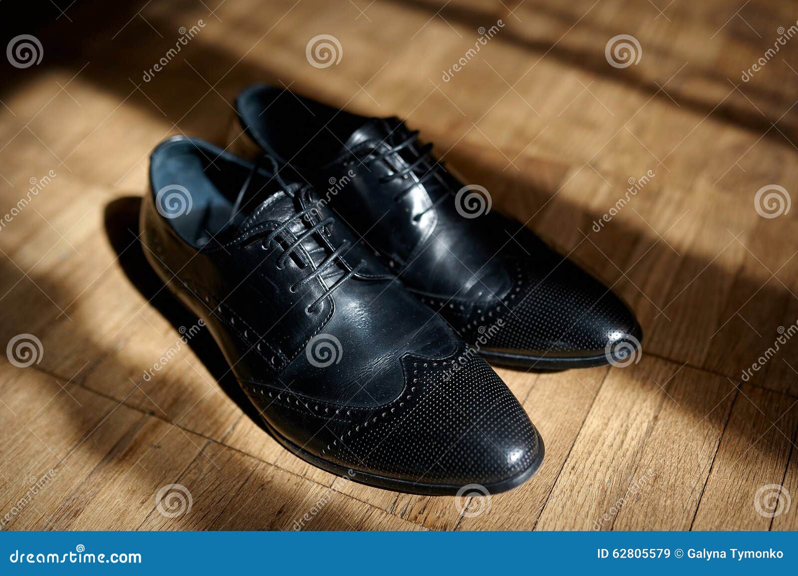 Pair of Men S Black Leather Ankle Shoes Placed on Wooden Floor Stock ...