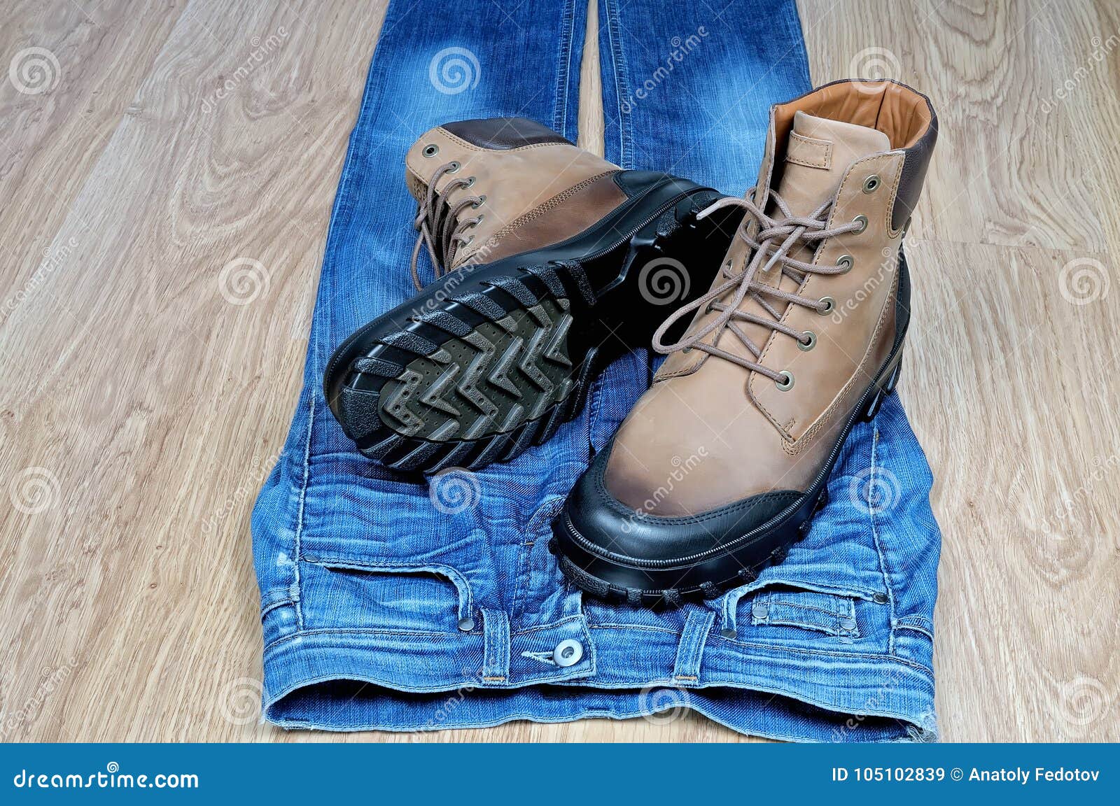 Men`s Leather Boots on Blue Jeans Stock Image - Image of foot, floor ...