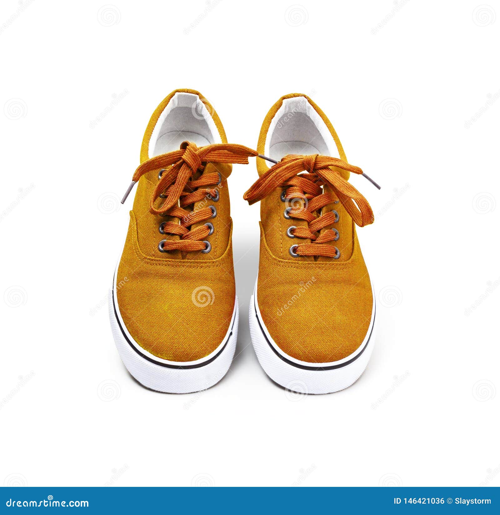 A Pair of Orange Color Canvas Shoes Isolated on White Stock Photo ...