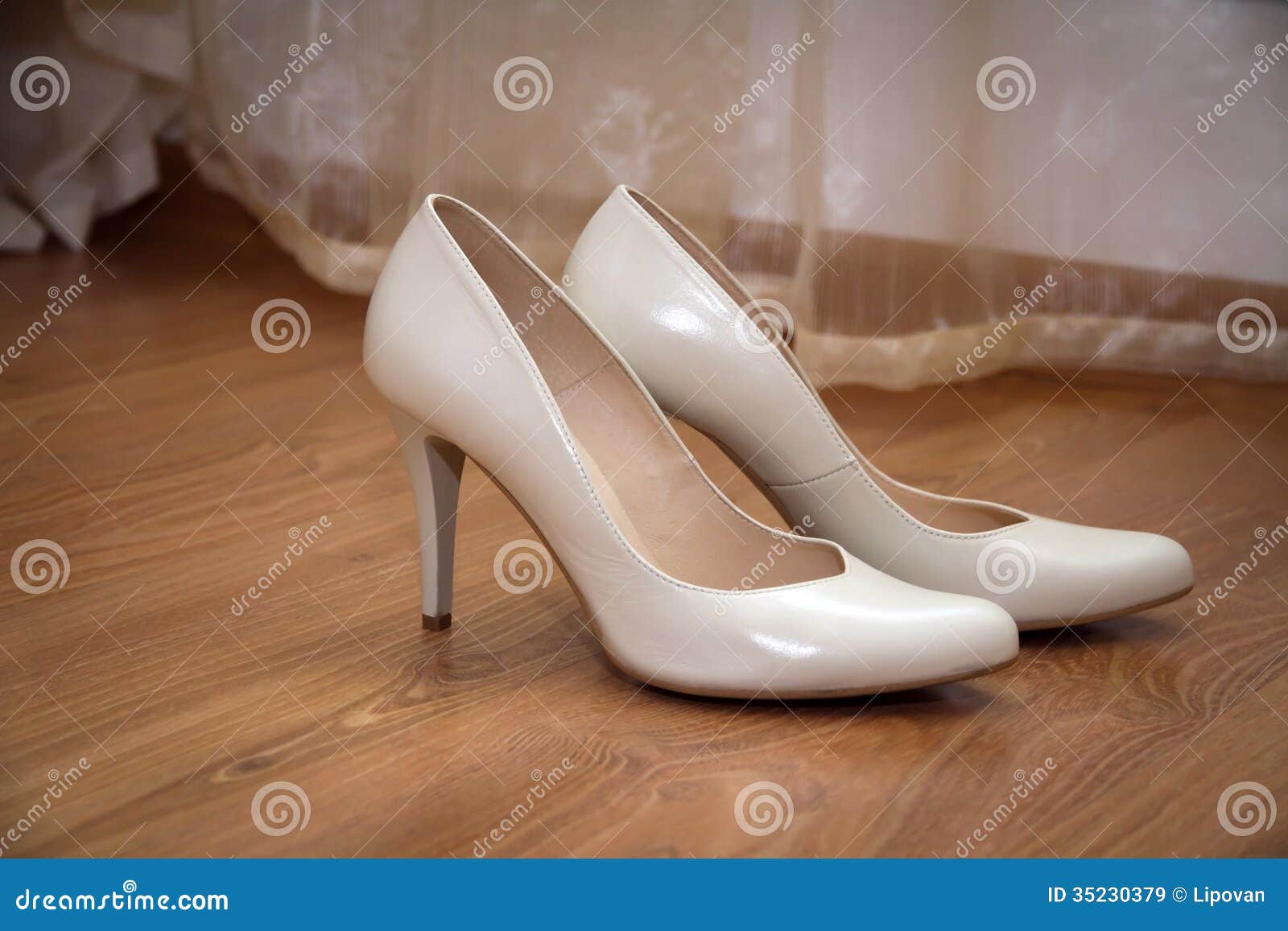 A Pair Of Pale Cream-colored Wedding Women's Shoes Royalty Free Stock ...