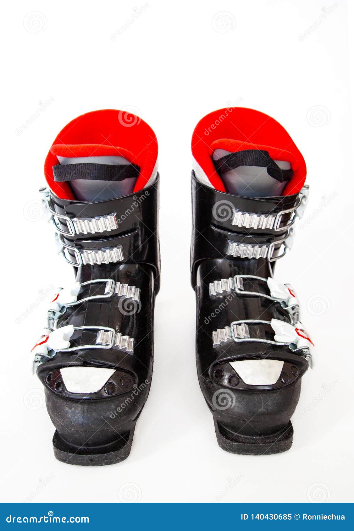 Pair of Red and Black Ski Boots Isolated on White Background Stock ...