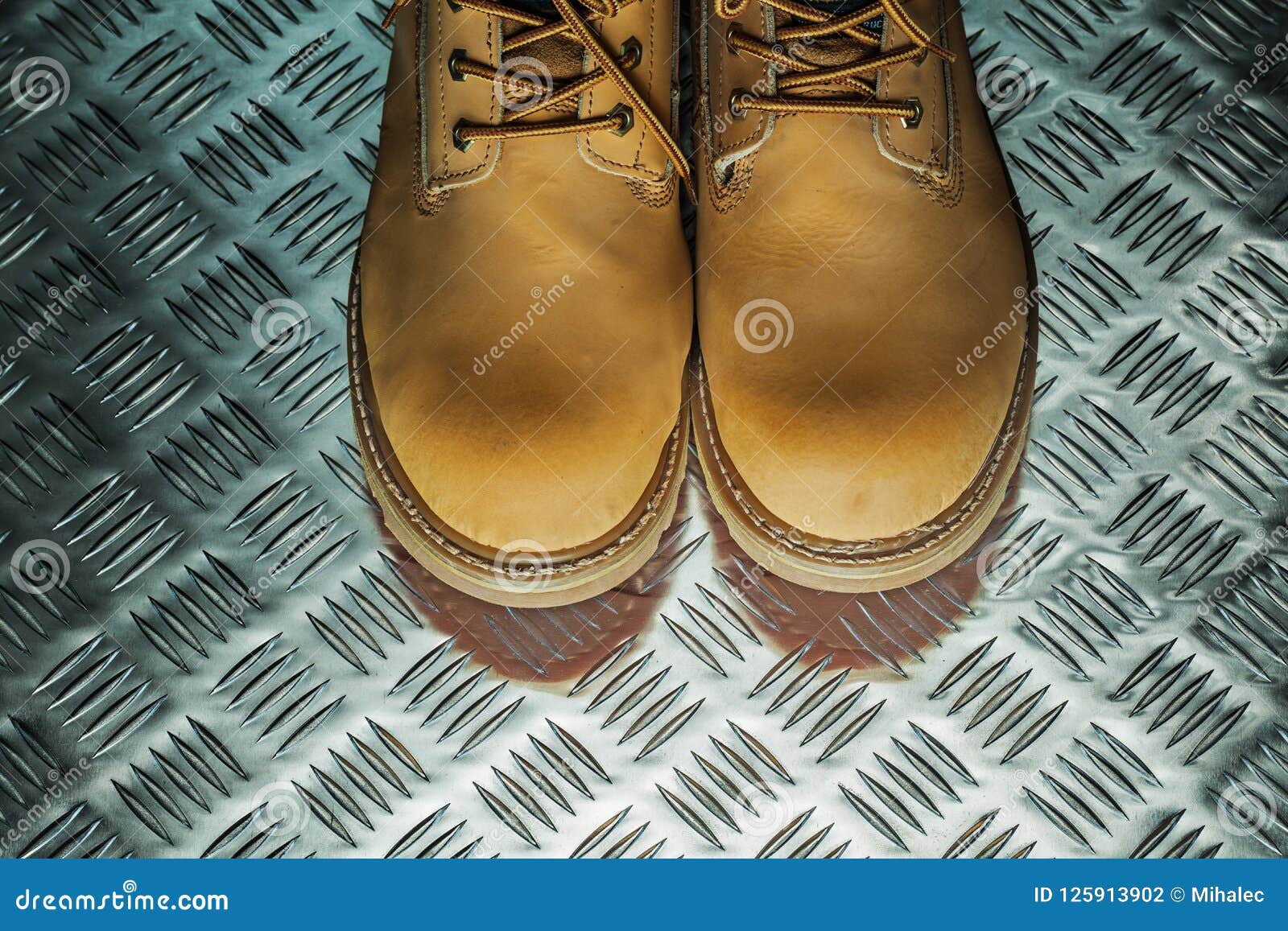 Pair of Safety Boots on Corrugated Metal Plate Stock Photo - Image of ...